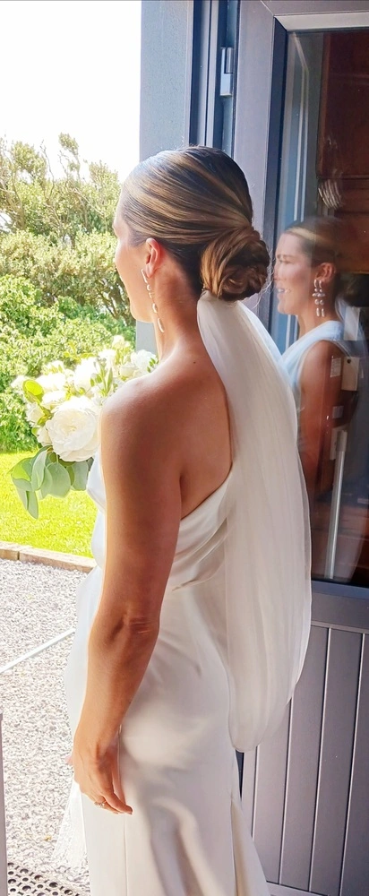 Low bun hairstyle for Brides Galway